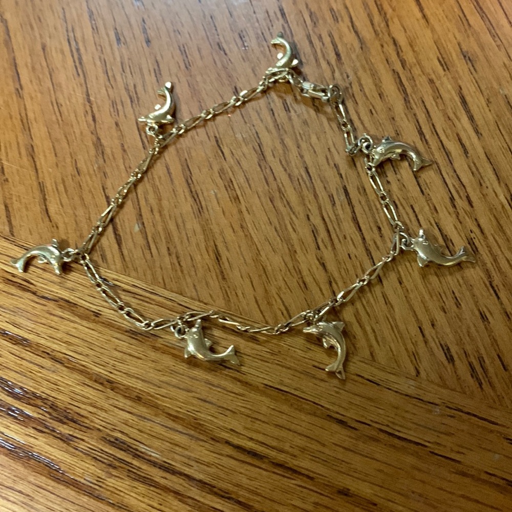 Beautiful ankle bracelet with dolphin charms dangle